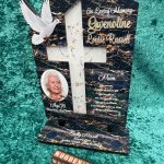 Traditional wooden plaque with black engraving